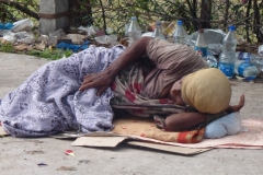 old woman, sleeping on the street