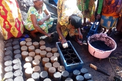 Training widows in the production of charcoal from biological waste